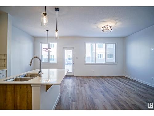 1308 13 Av Nw, Edmonton, AB - Indoor Photo Showing Kitchen With Double Sink