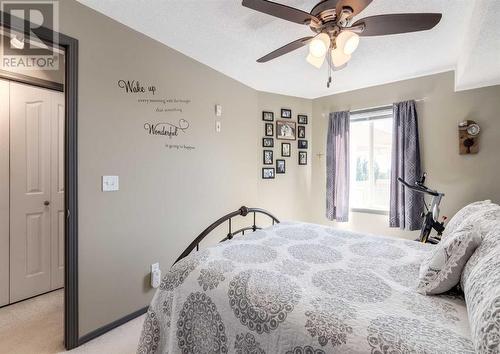 410, 6000 Somervale Court Sw, Calgary, AB - Indoor Photo Showing Bedroom