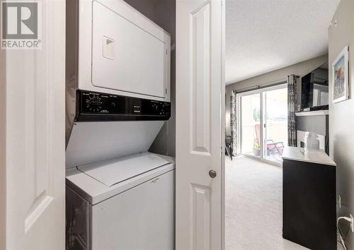 410, 6000 Somervale Court Sw, Calgary, AB - Indoor Photo Showing Laundry Room