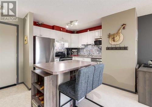 410, 6000 Somervale Court Sw, Calgary, AB - Indoor Photo Showing Kitchen