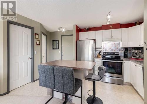 410, 6000 Somervale Court Sw, Calgary, AB - Indoor Photo Showing Kitchen