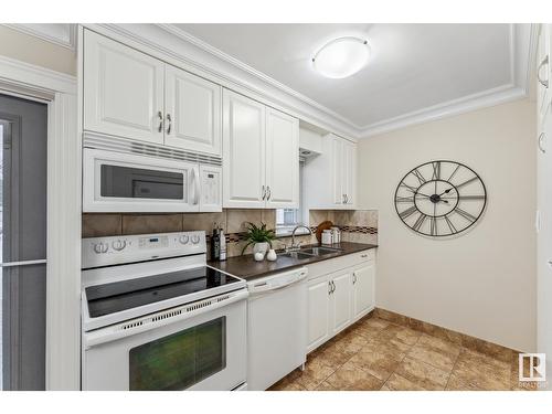 11343 54 St Nw, Edmonton, AB - Indoor Photo Showing Kitchen With Double Sink