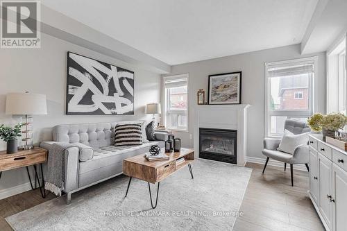 25 Beaumaris Crescent, Whitby, ON - Indoor Photo Showing Living Room With Fireplace