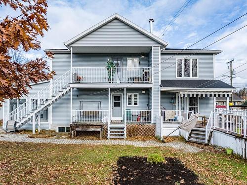 Face arriÃ¨re - 3128  - 3140 103E Avenue, Shawinigan, QC - Outdoor With Deck Patio Veranda With Facade