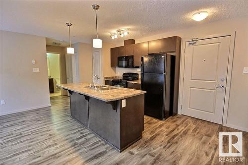 #221 344 Windermere Rd Nw, Edmonton, AB - Indoor Photo Showing Kitchen With Double Sink