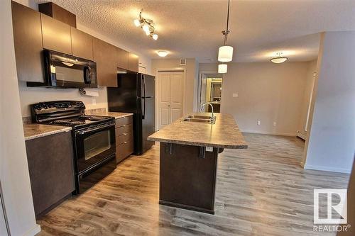 #221 344 Windermere Rd Nw, Edmonton, AB - Indoor Photo Showing Kitchen With Double Sink