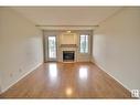 #316 237 Youville Dr Nw, Edmonton, AB  - Indoor Photo Showing Living Room With Fireplace 