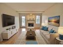 #316 237 Youville Dr Nw, Edmonton, AB  - Indoor Photo Showing Living Room With Fireplace 