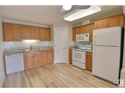 #316 237 Youville Dr Nw, Edmonton, AB - Indoor Photo Showing Kitchen With Double Sink