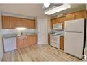 #316 237 Youville Dr Nw, Edmonton, AB  - Indoor Photo Showing Kitchen With Double Sink 