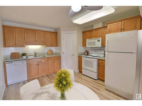 #316 237 Youville Dr Nw, Edmonton, AB - Indoor Photo Showing Kitchen With Double Sink