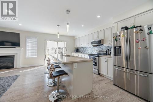 1033 Cameo Street, Pickering, ON - Indoor Photo Showing Kitchen With Fireplace With Upgraded Kitchen