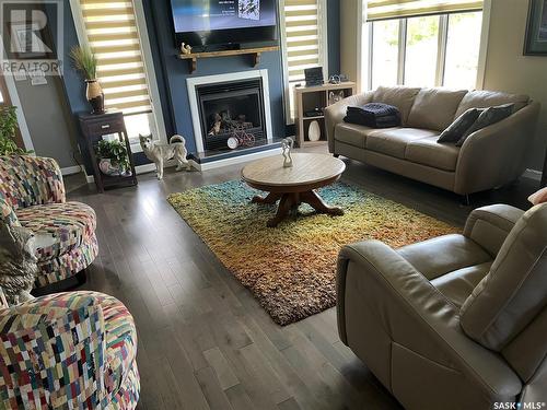 Iroquois Lake, Saskatchewan - Indoor Photo Showing Living Room With Fireplace