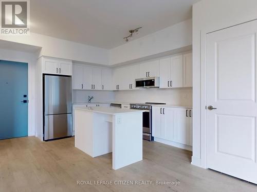 1108 - 1063 Douglas Mccurdy Comm, Mississauga, ON - Indoor Photo Showing Kitchen