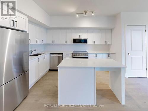 1108 - 1063 Douglas Mccurdy Comm, Mississauga, ON - Indoor Photo Showing Kitchen