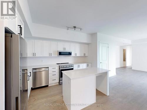 1108 - 1063 Douglas Mccurdy Comm, Mississauga, ON - Indoor Photo Showing Kitchen