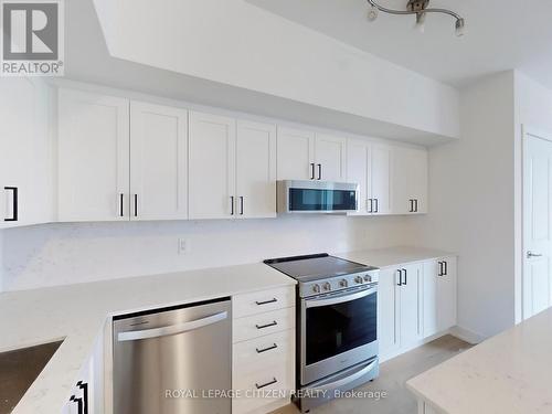 1108 - 1063 Douglas Mccurdy Comm, Mississauga, ON - Indoor Photo Showing Kitchen