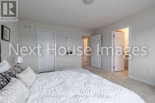 12 - 8317 Mulberry Drive, Niagara Falls, ON - Indoor Photo Showing Bedroom