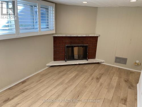 Lower L - 52 Claywood Road, Toronto, ON - Indoor Photo Showing Other Room With Fireplace