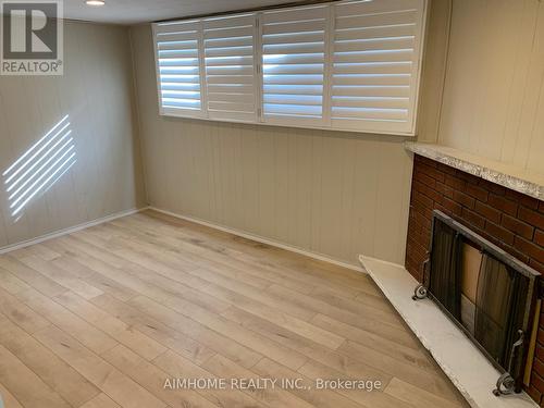 Lower L - 52 Claywood Road, Toronto, ON - Indoor Photo Showing Other Room With Fireplace