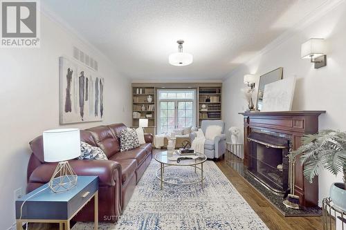 91 Kirk Drive, Markham, ON - Indoor Photo Showing Living Room With Fireplace