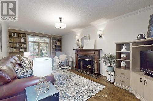 91 Kirk Drive, Markham, ON - Indoor Photo Showing Living Room With Fireplace