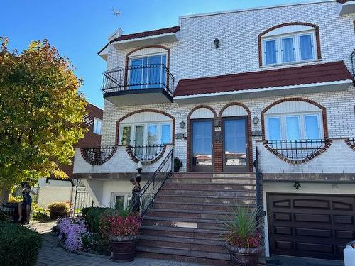 Exterior - 9062 Rue Descartes, Montréal (Saint-Léonard), QC - Outdoor With Balcony With Deck Patio Veranda With Facade