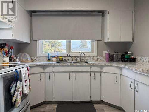 251 Fifth Avenue N, Yorkton, SK - Indoor Photo Showing Kitchen With Double Sink