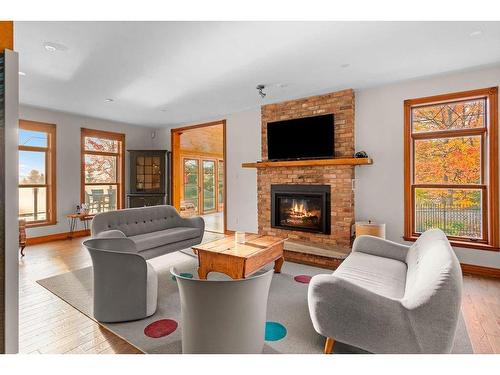 Living room - 200 Ch. De Villandry, Saint-Adolphe-D'Howard, QC - Indoor Photo Showing Living Room With Fireplace