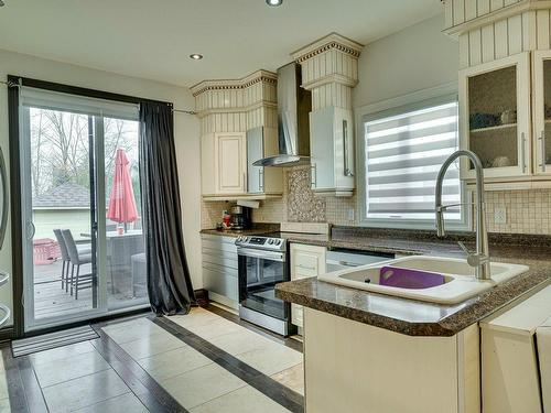 Kitchen - 6 Rue Notre-Dame-De-Laval, Laval (Sainte-Rose), QC - Indoor Photo Showing Kitchen With Double Sink