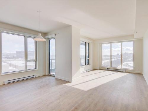 Living room - 202-1900 Rue Yvette-Brillon, Montréal (Ahuntsic-Cartierville), QC - Indoor Photo Showing Other Room