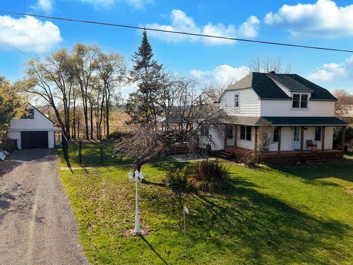 Photo aÃ©rienne - 1289 Ch. St-Guillaume, Sainte-Marthe, QC - Outdoor With Deck Patio Veranda With Facade