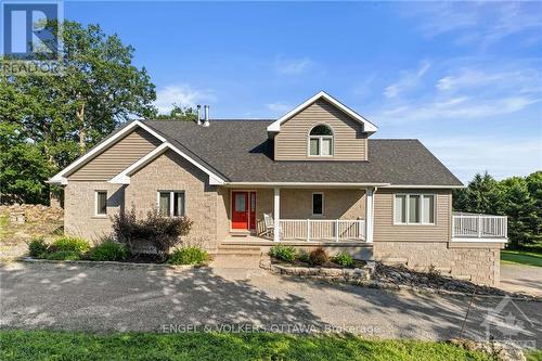 50 Belmonte Lane, Rideau Lakes (818 - Rideau Lakes (Bastard) Twp), ON - Outdoor With Deck Patio Veranda With Facade