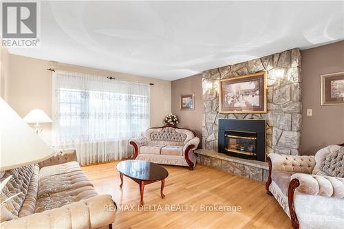 212 Charron Street, Prescott And Russell, ON - Indoor Photo Showing Living Room With Fireplace