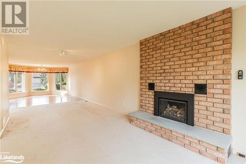 98 Navigators Trail, Bobcaygeon, ON - Indoor Photo Showing Living Room With Fireplace