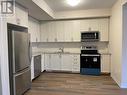 131 - 1573 Rose Way, Milton, ON  - Indoor Photo Showing Kitchen With Double Sink 