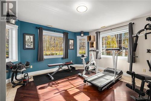 This bright beautiful  space is currently being used as a gym but would make a great Bedroom or office space. - 36 R1 Road, Smiths Falls, ON - Indoor Photo Showing Gym Room