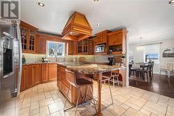 Custom built chef kitchen with granite counters and Italian Cermaic floors - 