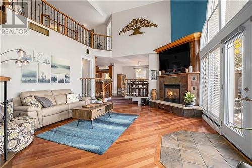 Stone Gas Fireplace makes this cosy all year round - 36 R1 Road, Smiths Falls, ON - Indoor Photo Showing Living Room With Fireplace