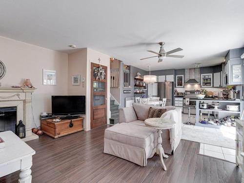 Salon - 594 Rue De Providence, Repentigny (Repentigny), QC - Indoor Photo Showing Living Room With Fireplace