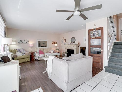 Salon - 594 Rue De Providence, Repentigny (Repentigny), QC - Indoor Photo Showing Living Room With Fireplace