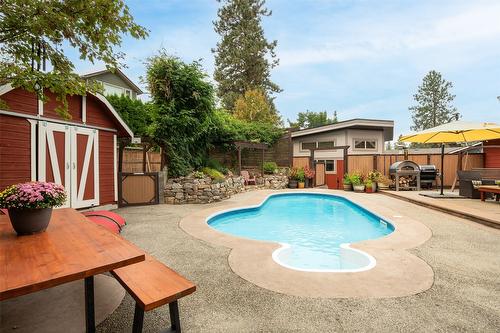 677 Drummond Court, Kelowna, BC - Outdoor With In Ground Pool With Deck Patio Veranda With Backyard