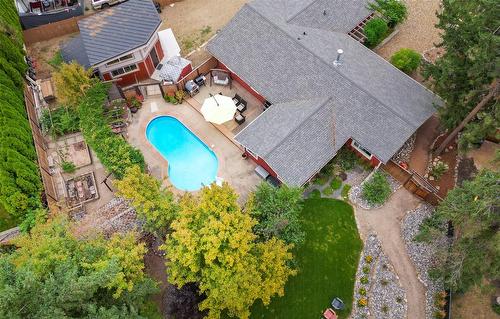 677 Drummond Court, Kelowna, BC - Outdoor With In Ground Pool