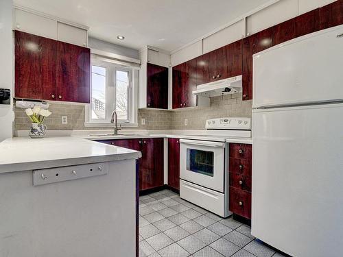 Cuisine - 1625 Crois. Tourangeau, Brossard, QC - Indoor Photo Showing Kitchen