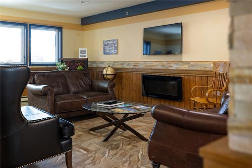 202-148 Silver Lode Lane, Vernon, BC - Indoor Photo Showing Living Room With Fireplace