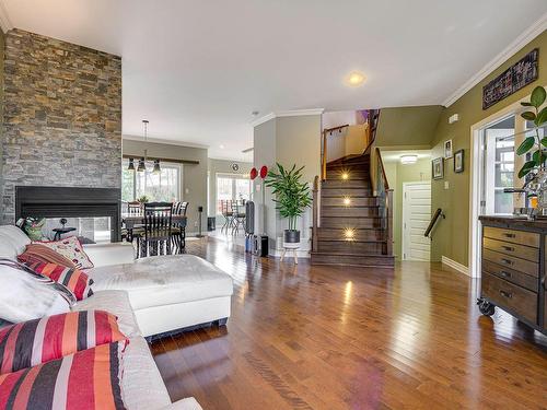 Overall view - 2099 Rue De L'Estran, Saint-Jérôme, QC - Indoor Photo Showing Living Room With Fireplace