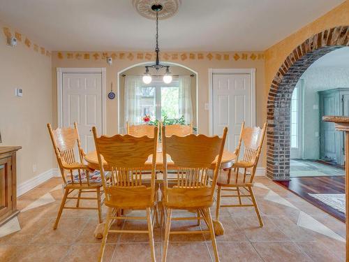 Dining room - 11 Rue Marcotte, Deschambault-Grondines, QC - Indoor Photo Showing Dining Room With Fireplace