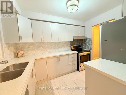 119 - 2779 Gananoque Drive, Mississauga, ON - Indoor Photo Showing Kitchen With Double Sink