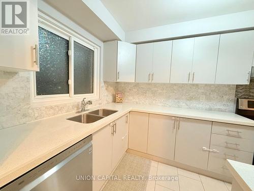 119 - 2779 Gananoque Drive, Mississauga, ON - Indoor Photo Showing Kitchen With Double Sink