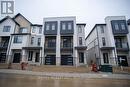 40 - 55 Tom Brown Drive, Brant, ON  - Outdoor With Balcony With Facade 